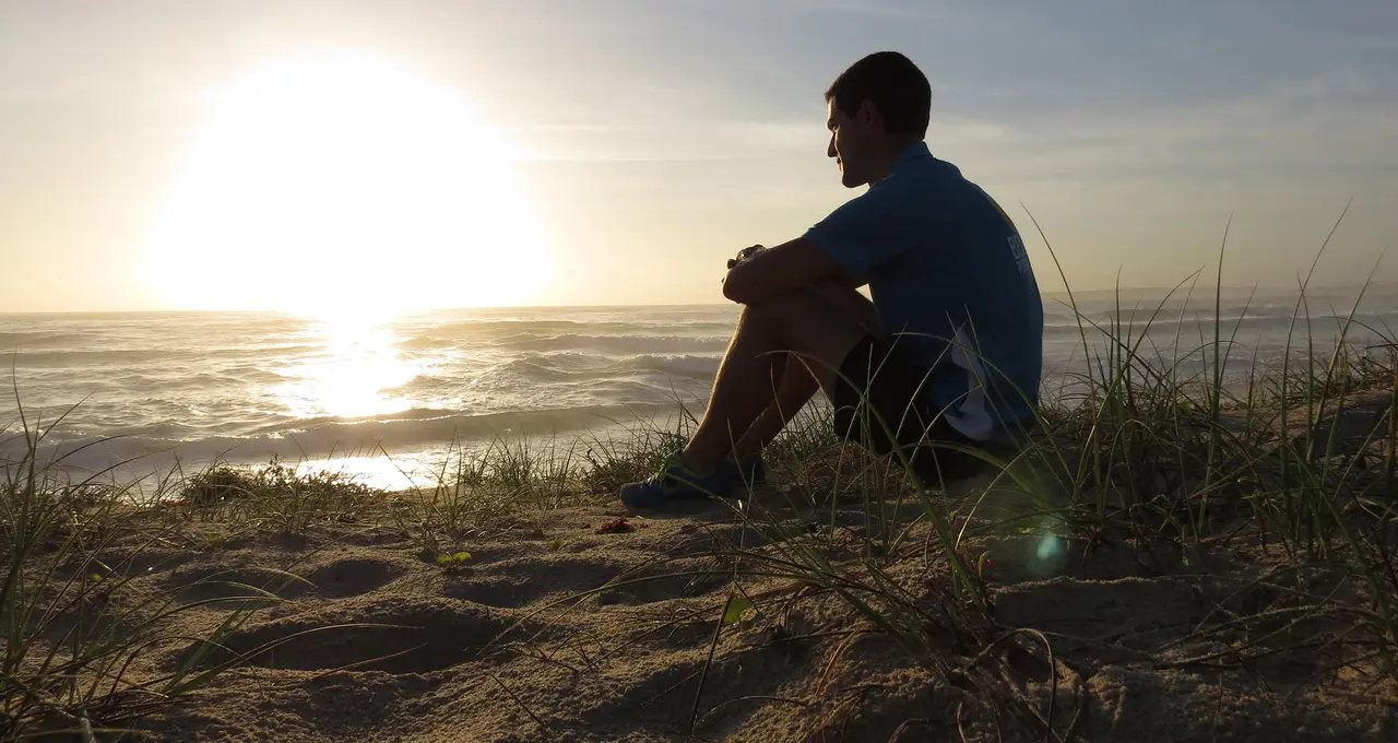 Sitting in the dunes watching the sun come up over the beach