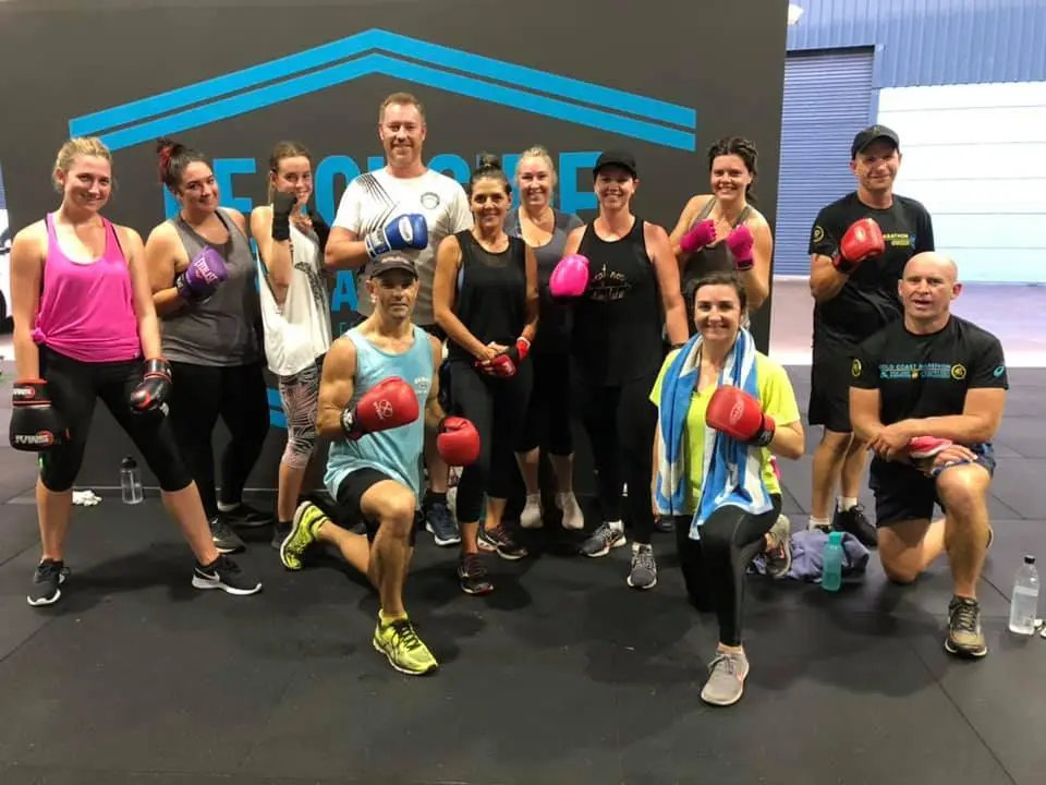 The Beachside team with boxing gloves in the studio